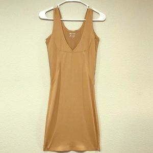 Tan slimming under dress